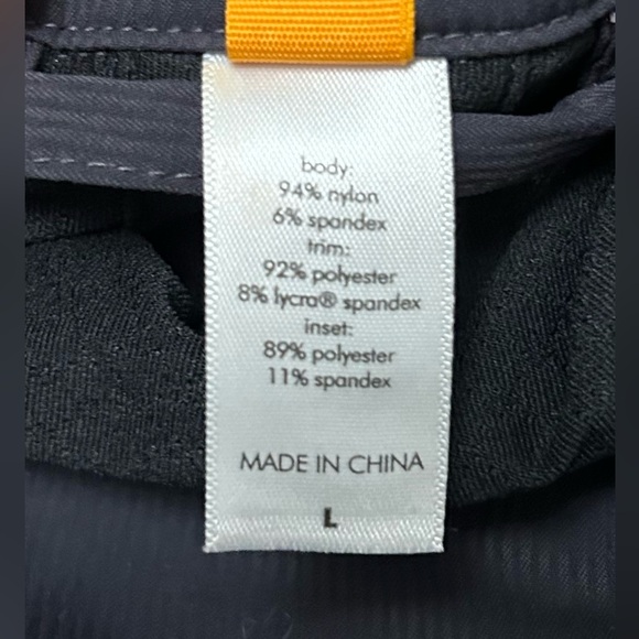 Lucy Black Jacket with Orange Brand Tag size large - Picture 8 of 8